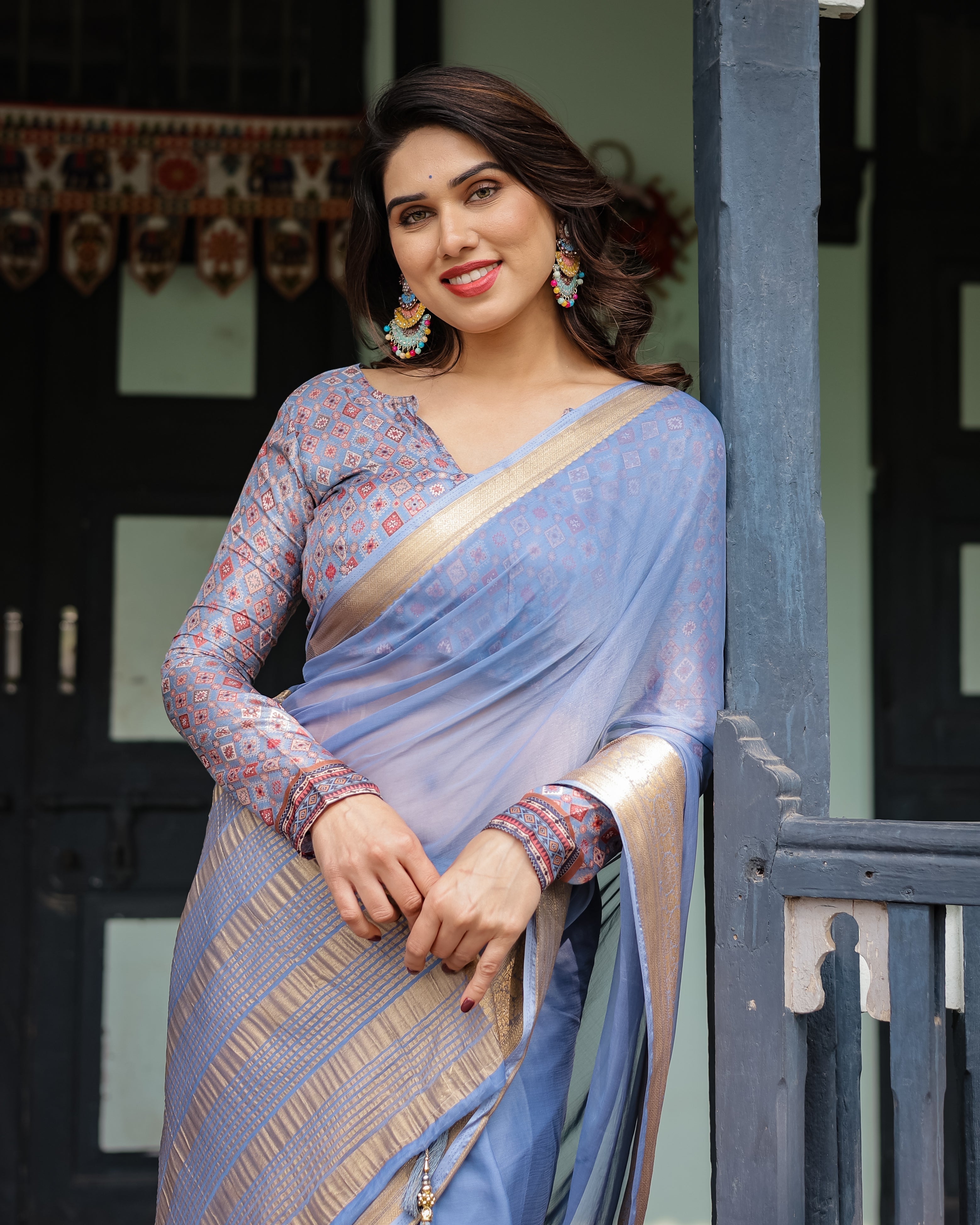 Sky Blue Plain Chiffon Saree with Gold Zari Border, Geometric Printed Blouse & Tassel Detailing CHIFFON