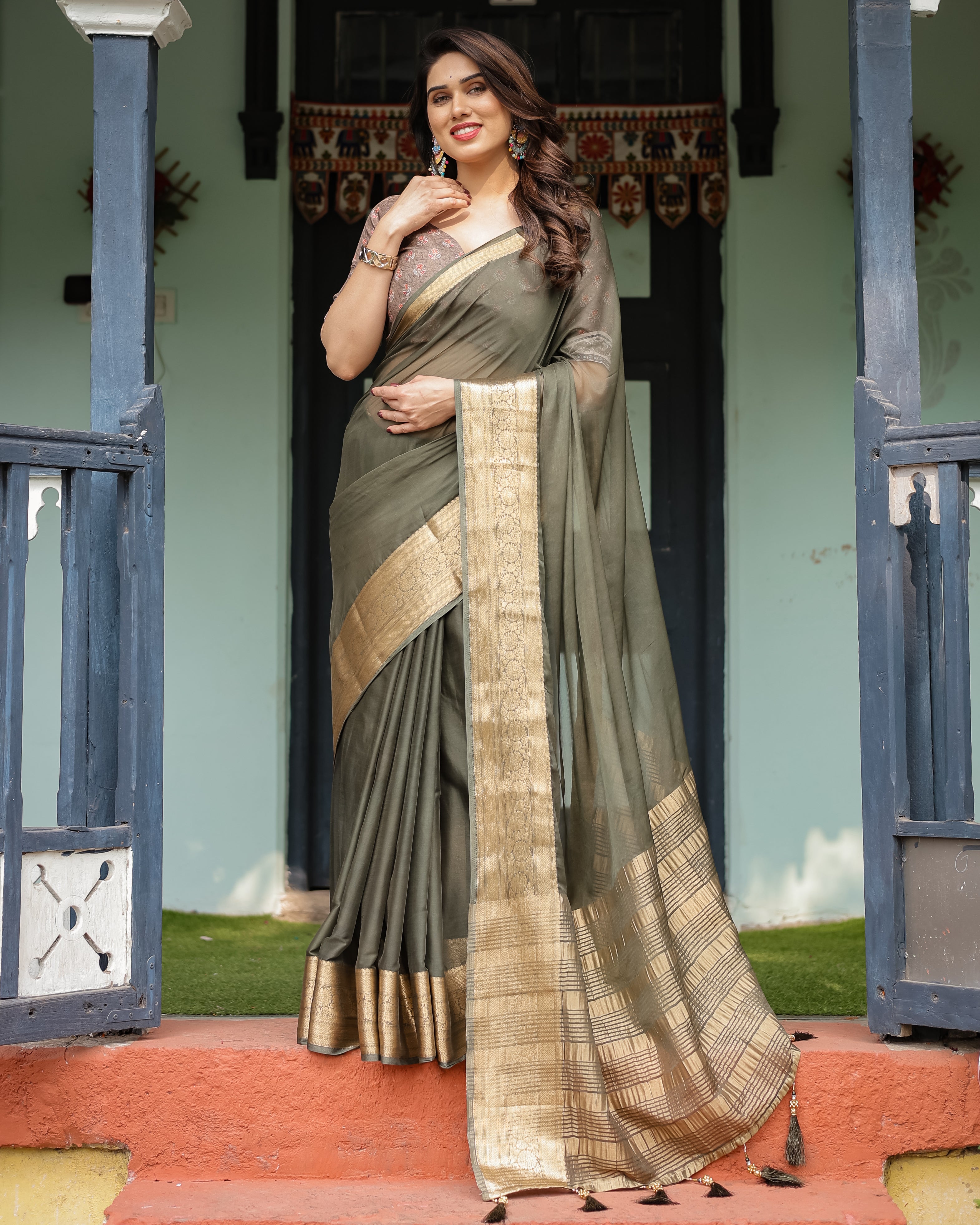 Elegant Olive Green Plain Chiffon Saree with Gold Zari Border, Floral Printed Blouse & Tassel Detailing CHIFFON Main image
