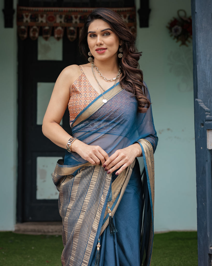Teal Blue Plain Chiffon Saree with Gold Zari Border, Geometric Printed Blouse & Tassel Detailing CHIFFON