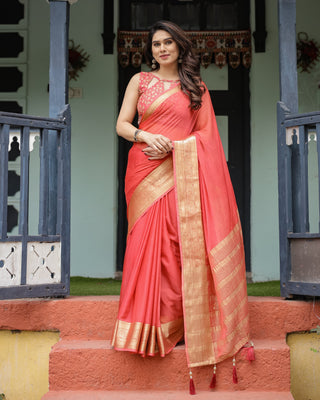 Graceful Coral Pink Plain Chiffon Saree with Gold Zari Border, Floral Embroidered Blouse & Tassel Detailing CHIFFON