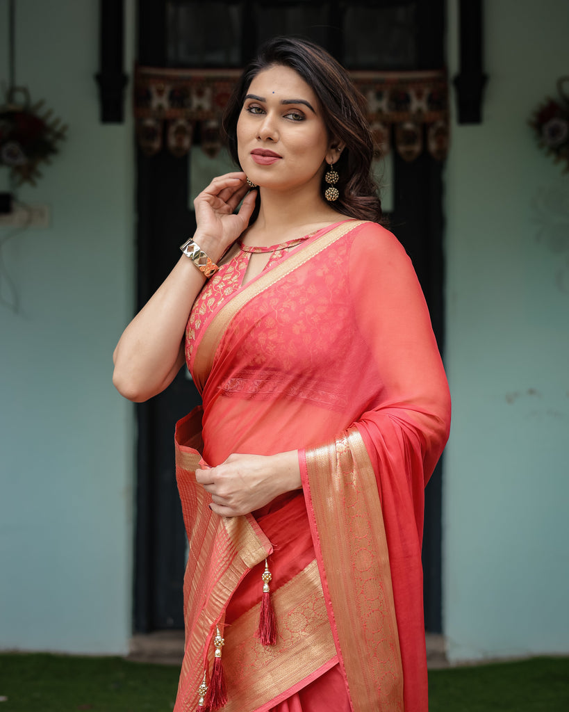 Graceful Coral Pink Plain Chiffon Saree with Gold Zari Border, Floral Embroidered Blouse & Tassel Detailing CHIFFON