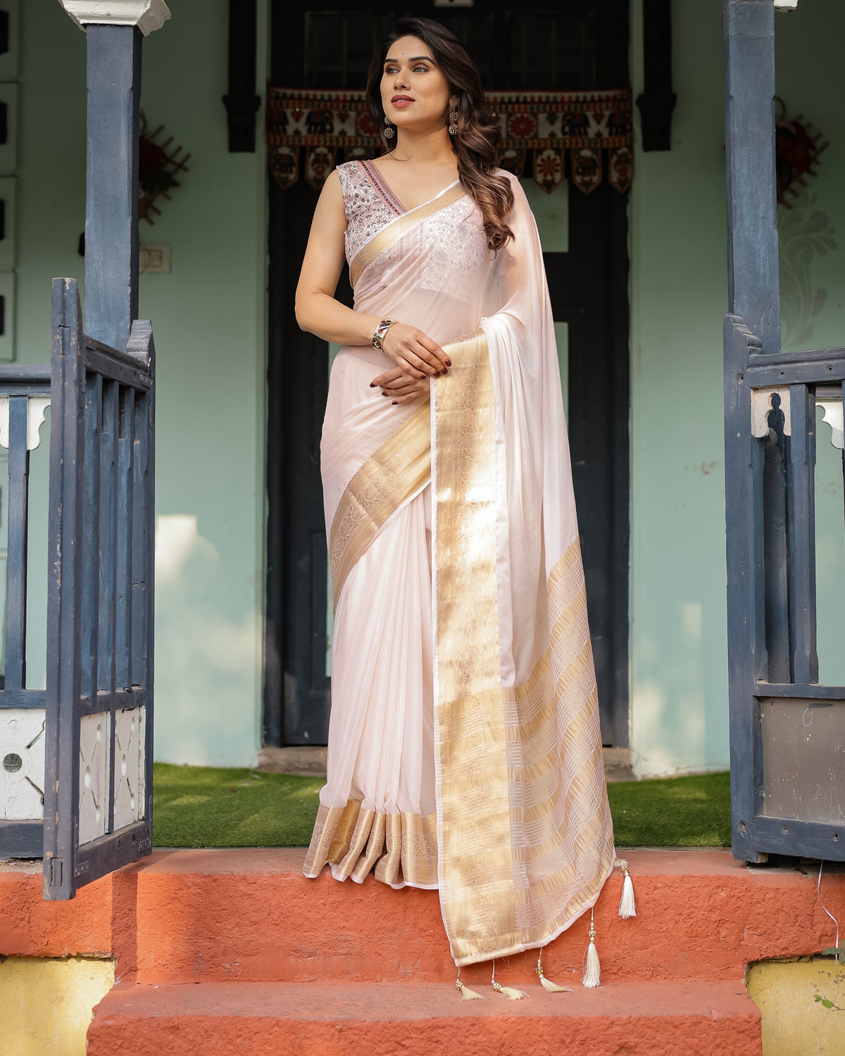 Ethereal Off-White Plain Chiffon Saree with Gold Zari Border, Intricate Floral Printed Blouse & Tassel Detailing CHIFFON Main image