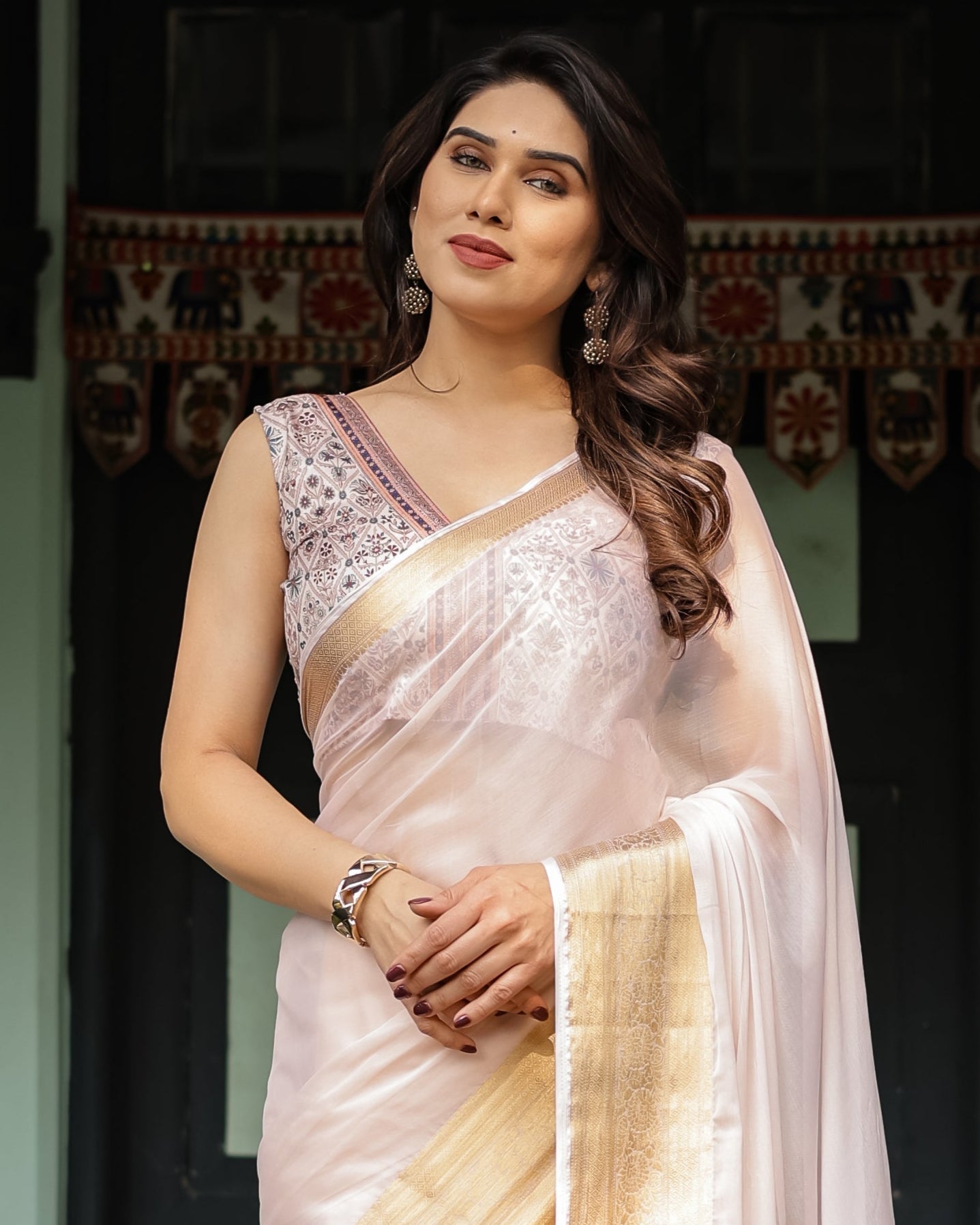 Ethereal Off-White Plain Chiffon Saree with Gold Zari Border, Intricate Floral Printed Blouse & Tassel Detailing CHIFFON