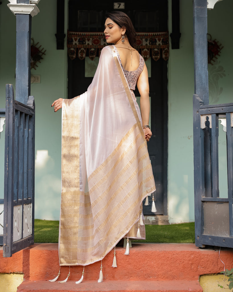 Ethereal Off-White Plain Chiffon Saree with Gold Zari Border, Intricate Floral Printed Blouse & Tassel Detailing CHIFFON