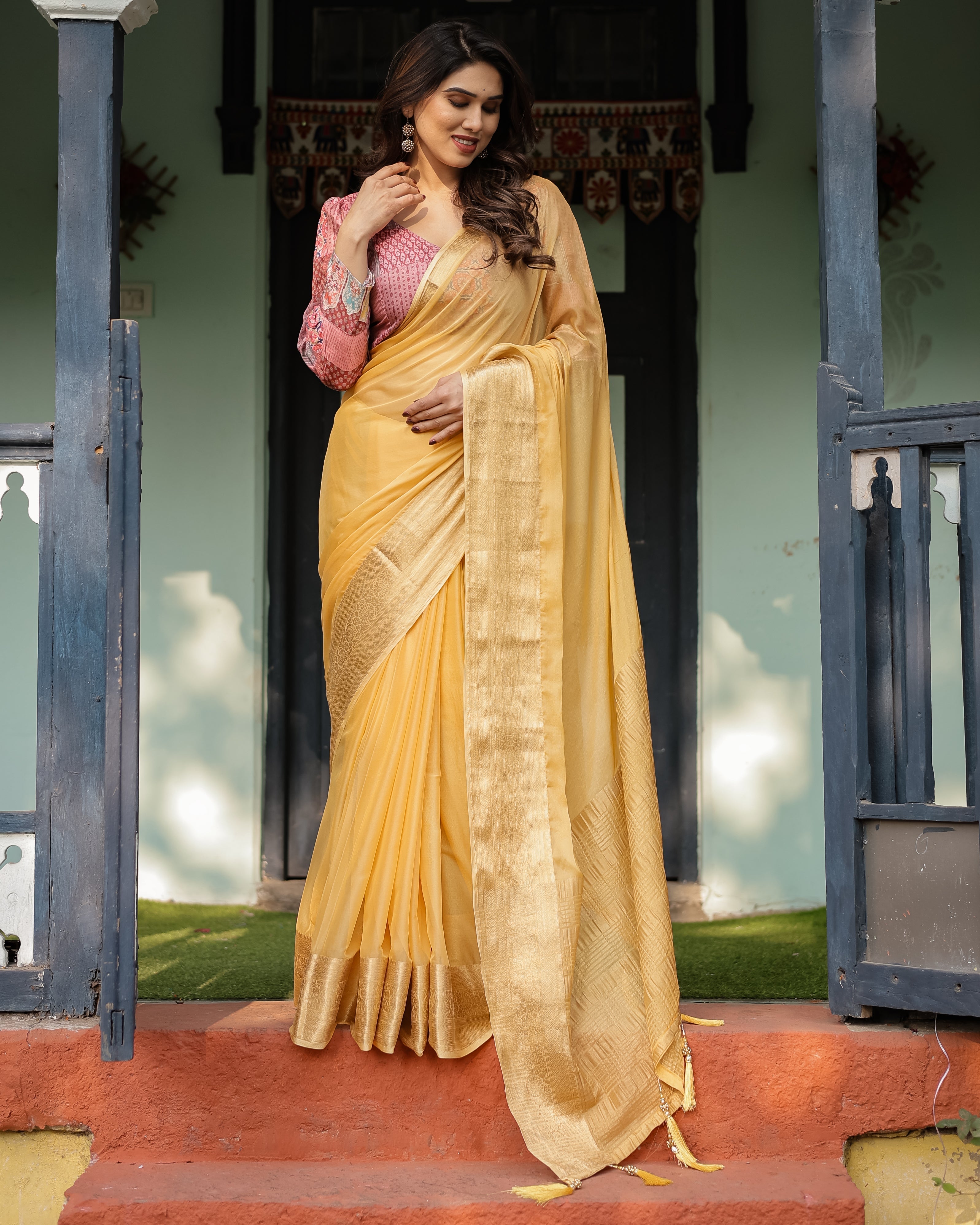 Radiant Mustard Yellow Plain Chiffon Saree with Gold Zari Border, Printed Designer Blouse & Tassel Detailing CHIFFON Main image