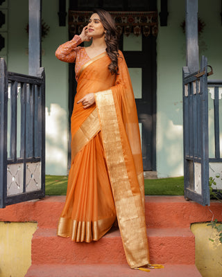 Sunset Orange Plain Chiffon Saree with Gold Zari Border, Floral Embroidered Blouse & Tassel Detailing CHIFFON