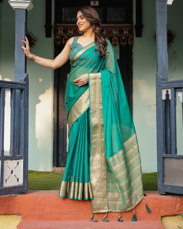 Elegant Sea Green Plain Chiffon Saree with Gold Zari Border, Paisley Printed Blouse & Tassel Detailing CHIFFON