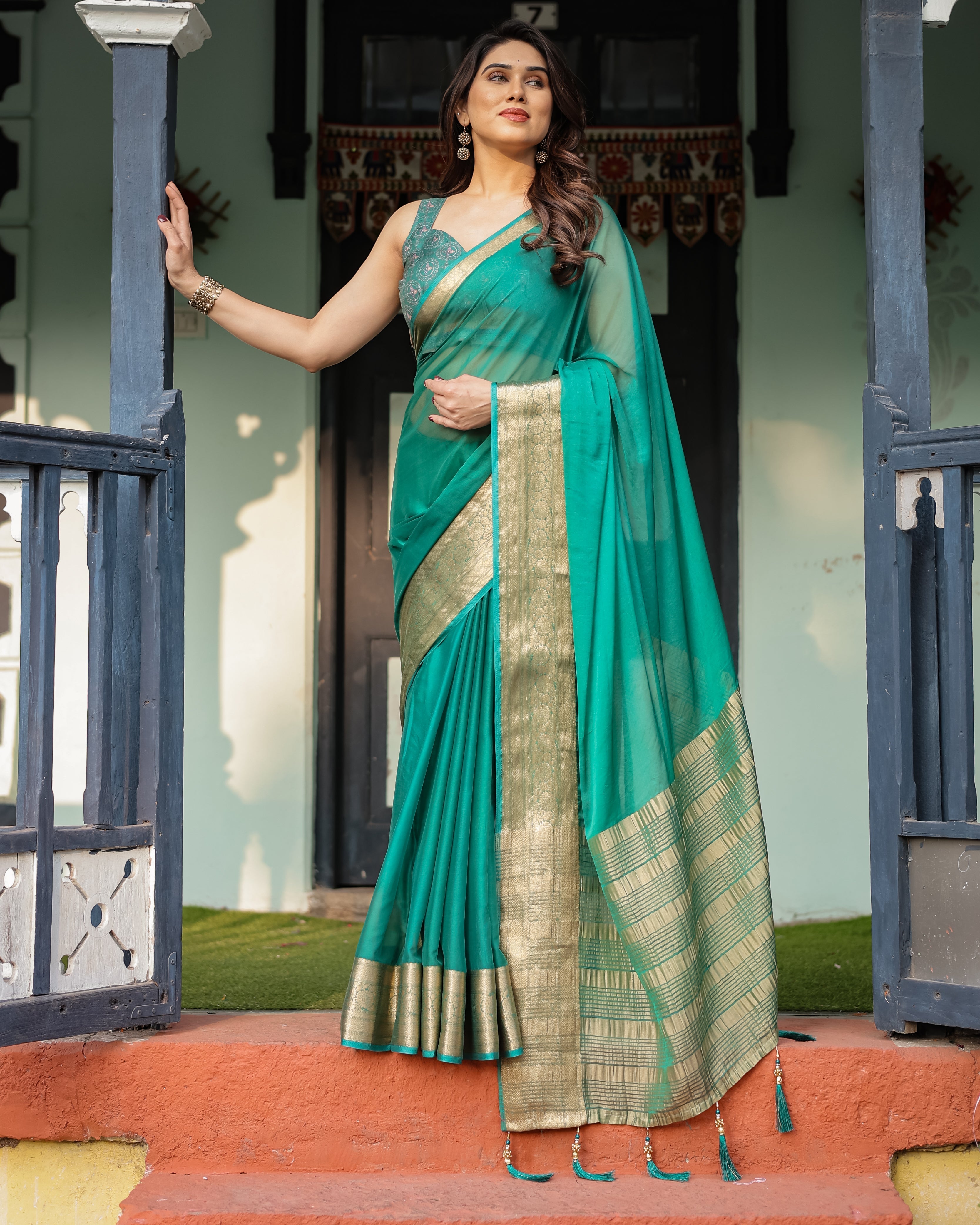 Elegant Sea Green Plain Chiffon Saree with Gold Zari Border, Paisley Printed Blouse & Tassel Detailing CHIFFON