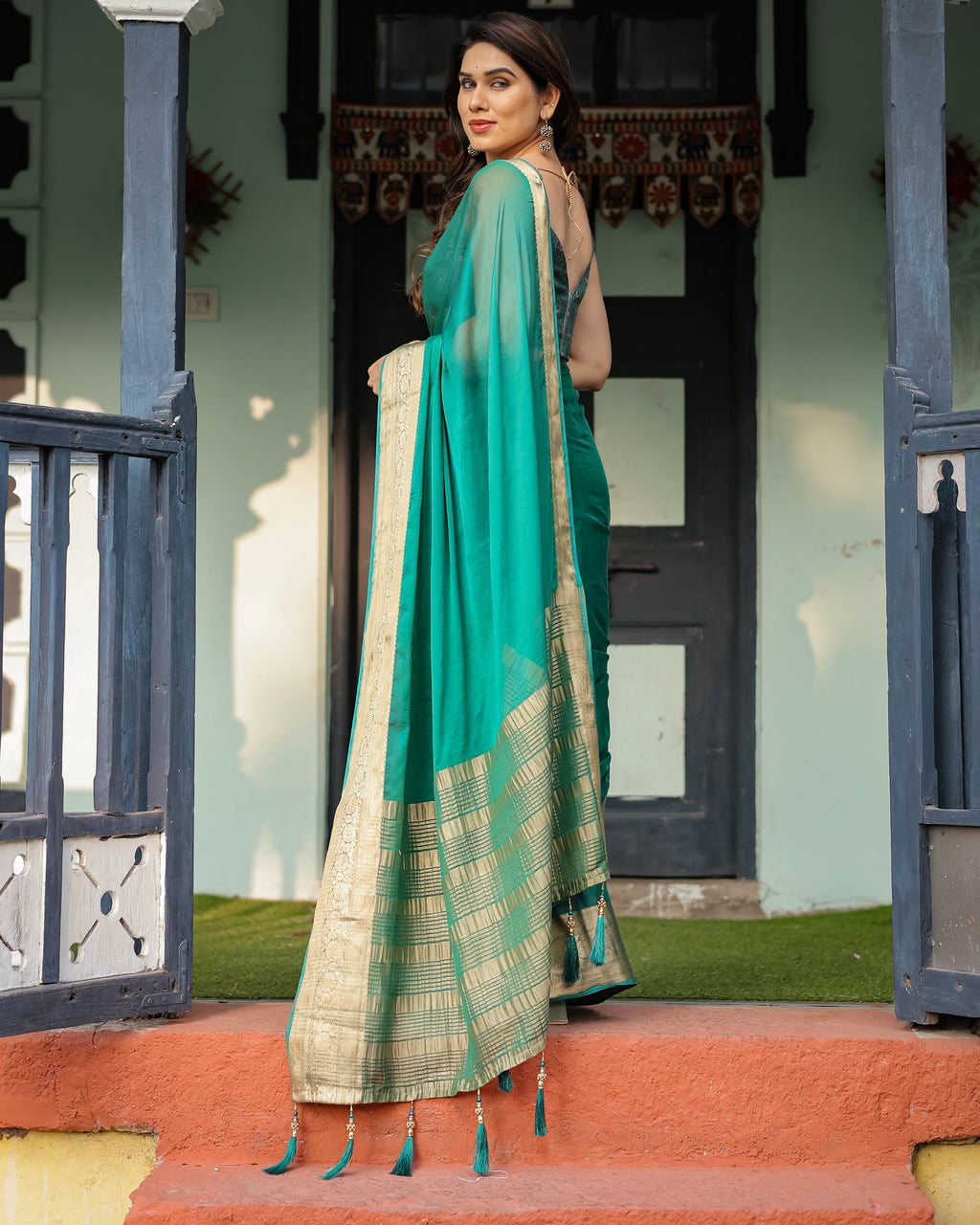 Elegant Sea Green Plain Chiffon Saree with Gold Zari Border, Paisley Printed Blouse & Tassel Detailing CHIFFON