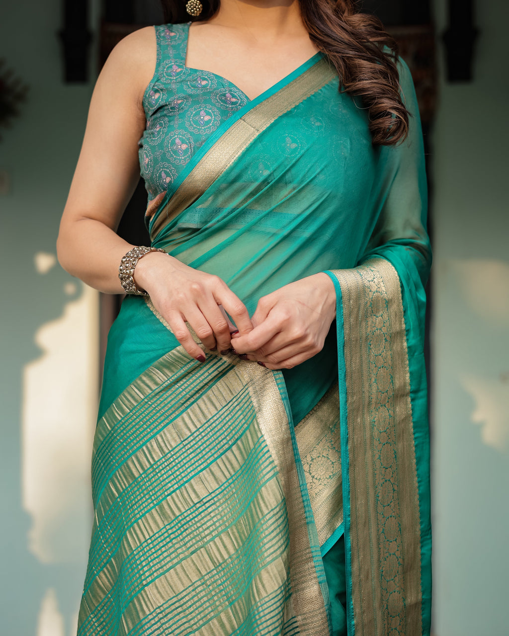 Elegant Sea Green Plain Chiffon Saree with Gold Zari Border, Paisley Printed Blouse & Tassel Detailing CHIFFON