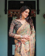 Load image into Gallery viewer, Sage Green with Bold Floral Motifs Linen Cotton Handloom Printed Saree, Vibrant Peacock Pallu, and Tassels LINEN HANDLOOM