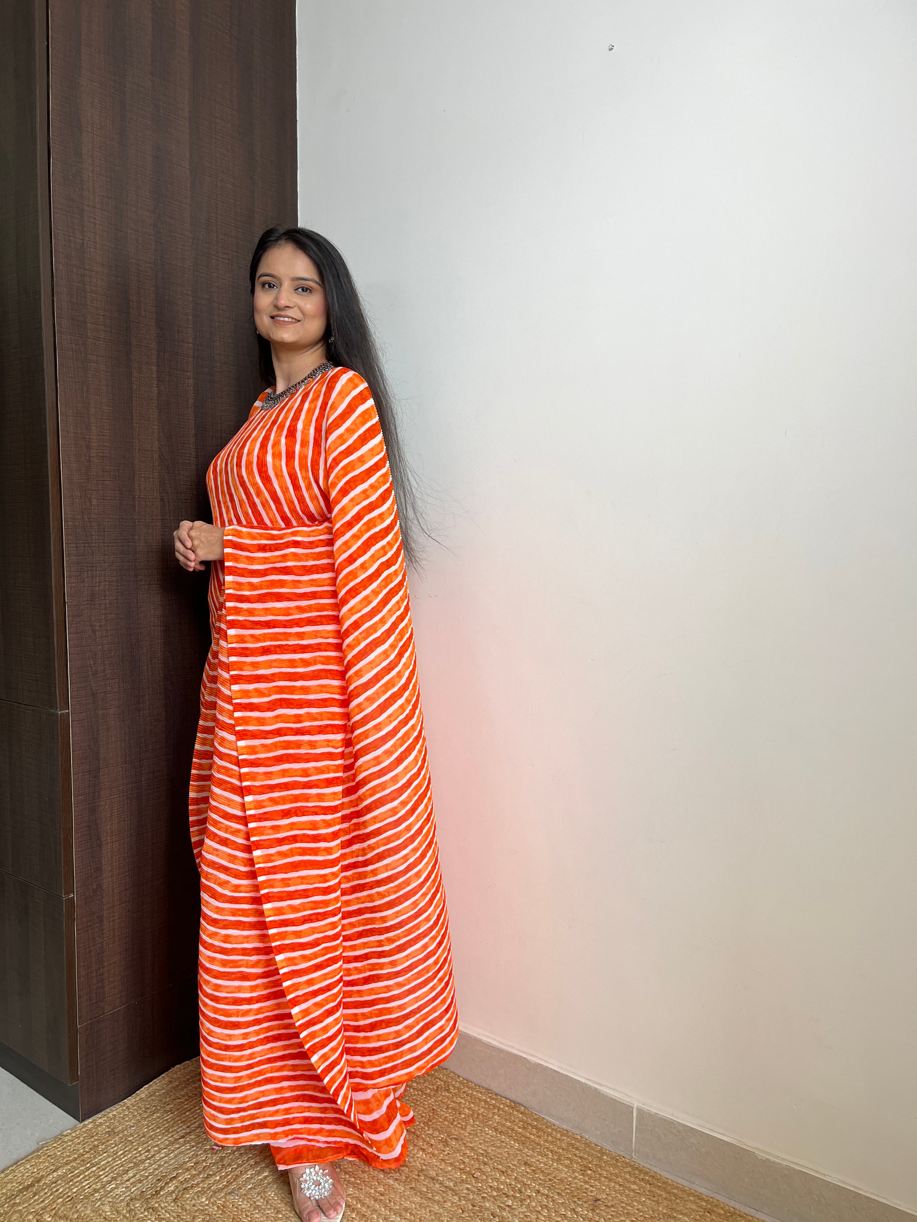 Orange Faux Georgette Crushed Saree Gown Secondary image