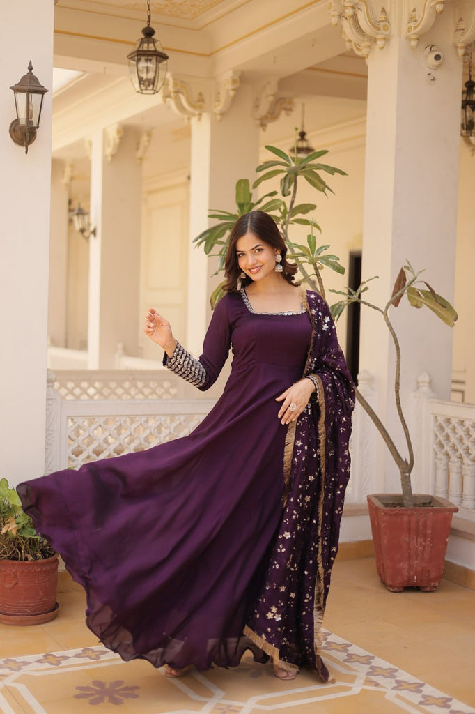 Embrace timeless elegance with our meticulously crafted Vichitra silk Purple gown and dupatta set. ClothsVilla