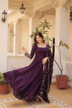 Load image into Gallery viewer, Embrace timeless elegance with our meticulously crafted Vichitra silk Purple gown and dupatta set. ClothsVilla