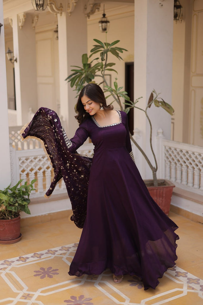 Embrace timeless elegance with our meticulously crafted Vichitra silk Purple gown and dupatta set. ClothsVilla