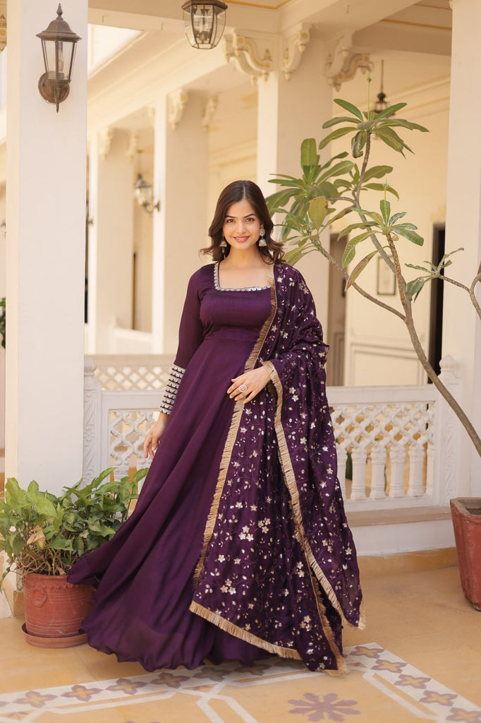 Embrace timeless elegance with our meticulously crafted Vichitra silk Purple gown and dupatta set. ClothsVilla