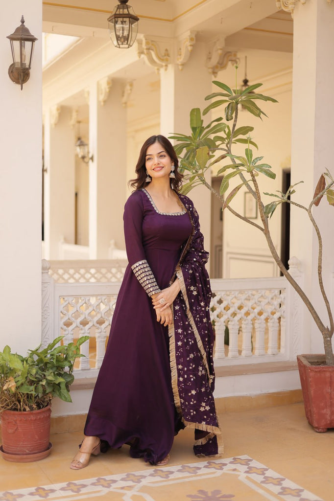 Embrace timeless elegance with our meticulously crafted Vichitra silk Purple gown and dupatta set. ClothsVilla