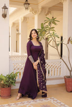 Load image into Gallery viewer, Embrace timeless elegance with our meticulously crafted Vichitra silk Purple gown and dupatta set. ClothsVilla