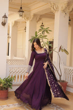 Load image into Gallery viewer, Embrace timeless elegance with our meticulously crafted Vichitra silk Purple gown and dupatta set. ClothsVilla