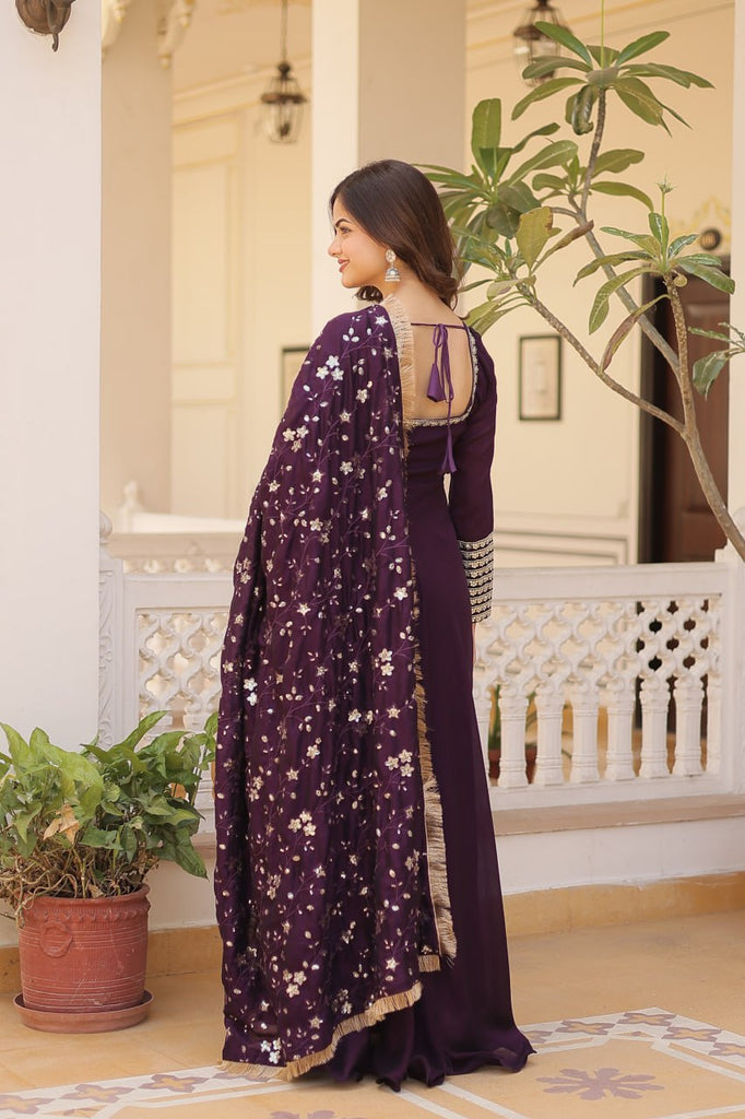 Embrace timeless elegance with our meticulously crafted Vichitra silk Purple gown and dupatta set. ClothsVilla