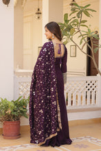 Load image into Gallery viewer, Embrace timeless elegance with our meticulously crafted Vichitra silk Purple gown and dupatta set. ClothsVilla