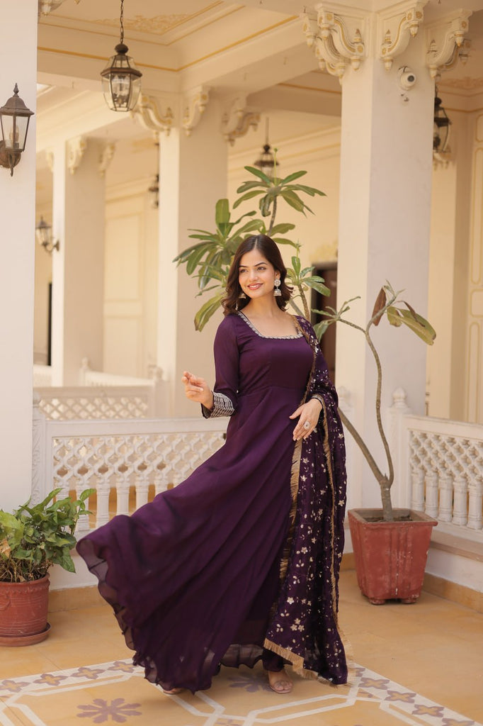 Embrace timeless elegance with our meticulously crafted Vichitra silk Purple gown and dupatta set. ClothsVilla