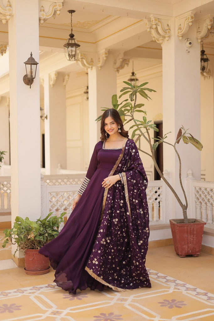 Embrace timeless elegance with our meticulously crafted Vichitra silk Purple gown and dupatta set. ClothsVilla