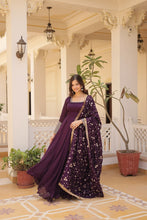 Load image into Gallery viewer, Embrace timeless elegance with our meticulously crafted Vichitra silk Purple gown and dupatta set. ClothsVilla