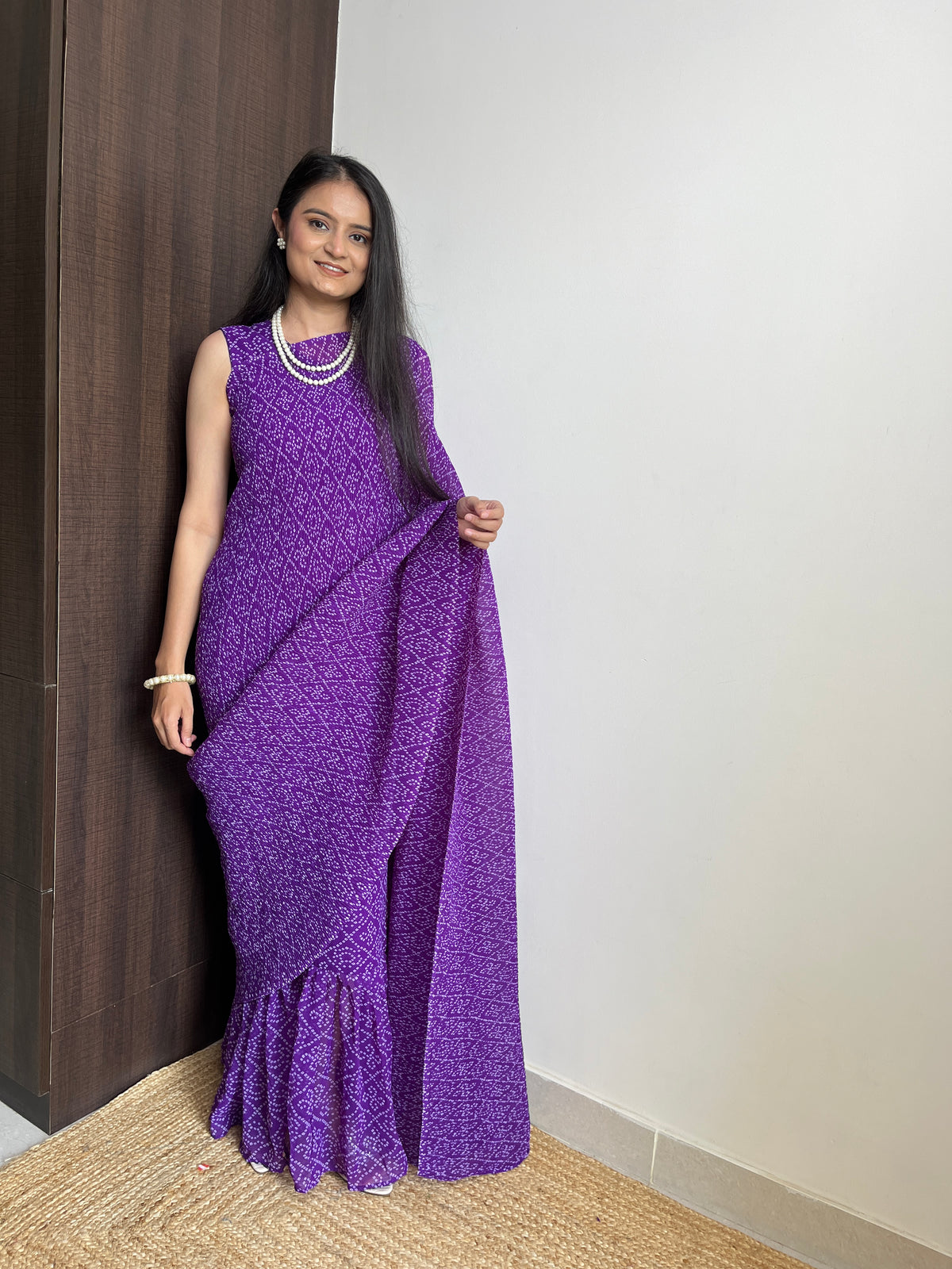 Purple Faux Georgette Saree Gown with Bandhani Print ClothsVilla