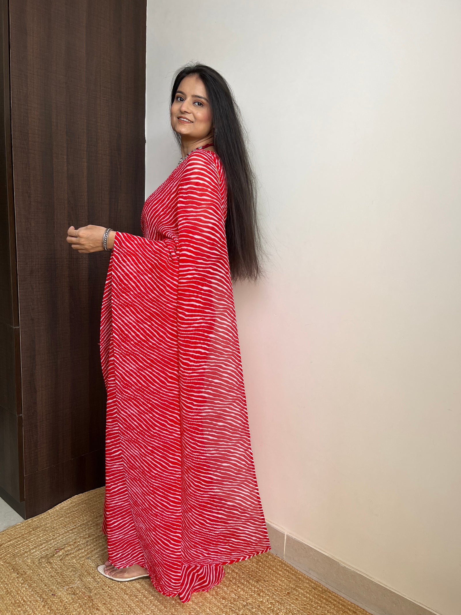 Red Faux Georgette Crushed Saree Gown with Digital Prints ClothsVilla