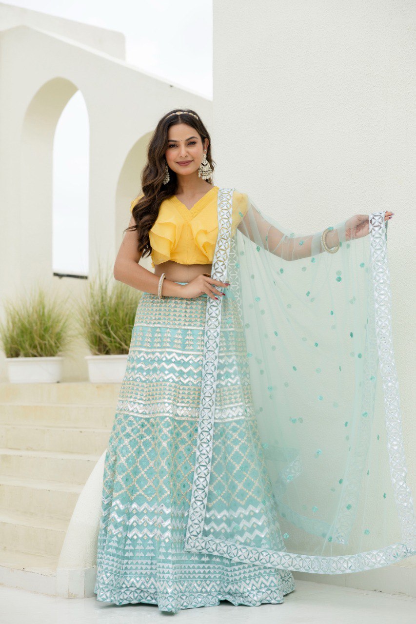 Sky & Yellow Graceful Organza Lehenga Set with Sequins & Foil Embroidery – Semi-Stitched Lehenga, Unstitched Blouse & Net Dupatta ClothsVilla