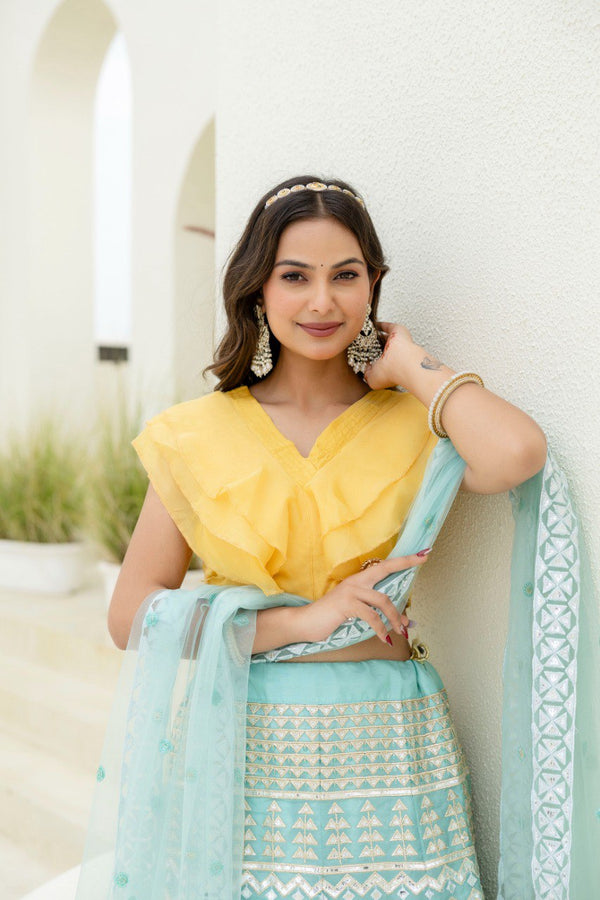 Sky & Yellow Graceful Organza Lehenga Set with Sequins & Foil Embroidery – Semi-Stitched Lehenga, Unstitched Blouse & Net Dupatta ClothsVilla
