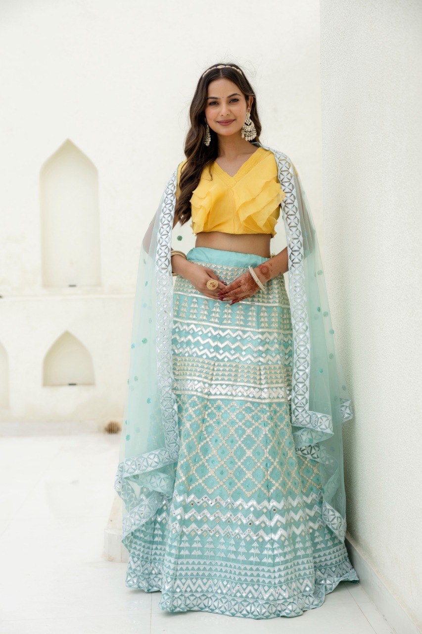 Sky & Yellow Graceful Organza Lehenga Set with Sequins & Foil Embroidery – Semi-Stitched Lehenga, Unstitched Blouse & Net Dupatta ClothsVilla