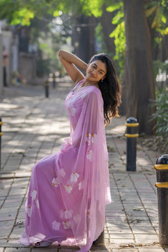 Lavender Pink Pure Georgette Hand-Painted Saree with White Floral Motifs & Sequin Detailing FANCY SAREES
