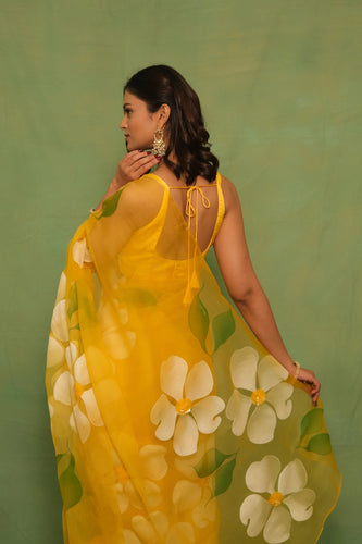 Sunshine Yellow Pure Organza Saree with Hand-Painted White Floral Motifs & Sequin Embellishments FANCY SAREES