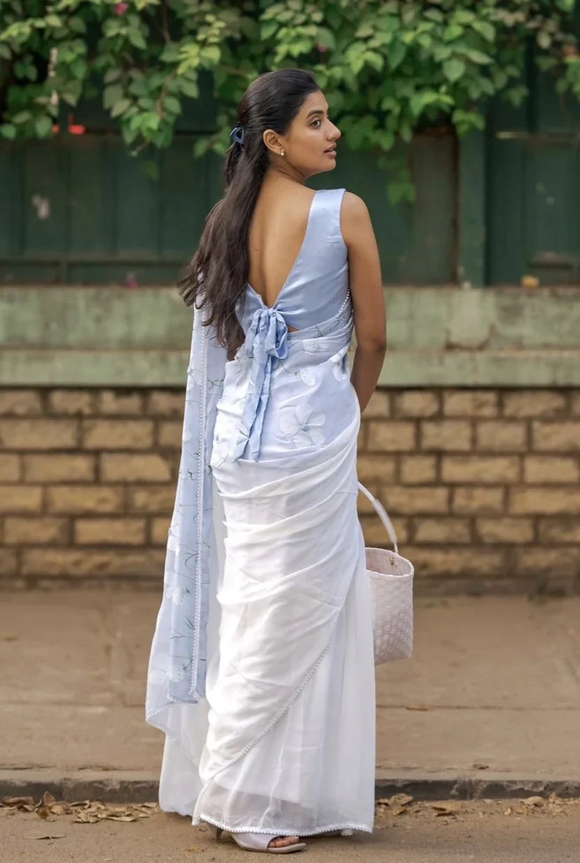 Sky Blue Pure Georgette Hand-Painted Saree with White Floral Motifs and Sequins | Modal Satin Blouse FANCY SAREES