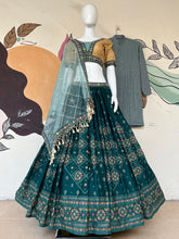Load image into Gallery viewer, Aqua Green Full Stitched Lehenga Choli Set with Heavy Foil Print and Embroidery Work ClothsVilla
