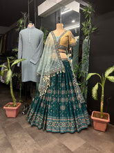 Load image into Gallery viewer, Aqua Green Full Stitched Lehenga Choli Set with Heavy Foil Print and Embroidery Work with Men Kurta Combo ClothsVilla