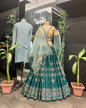 Load image into Gallery viewer, Aqua Green Full Stitched Lehenga Choli Set with Heavy Foil Print and Embroidery Work with Men Kurta Combo ClothsVilla