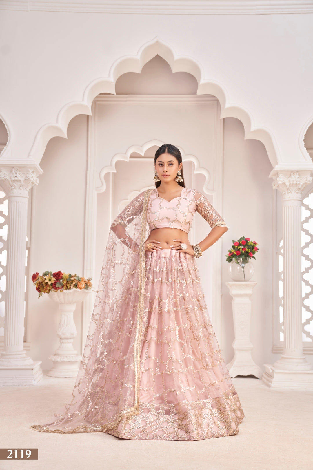 Baby Pink Elegant Butterfly Net Lehenga with Zari & Sequence Embroidery Clothsvilla