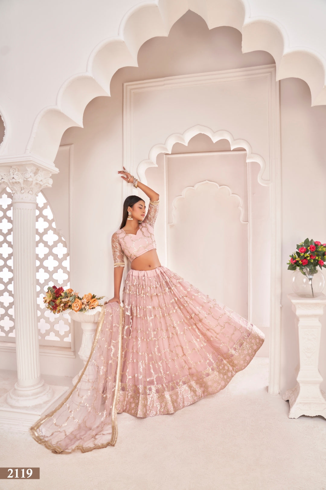 Baby Pink Elegant Butterfly Net Lehenga with Zari & Sequence Embroidery Clothsvilla