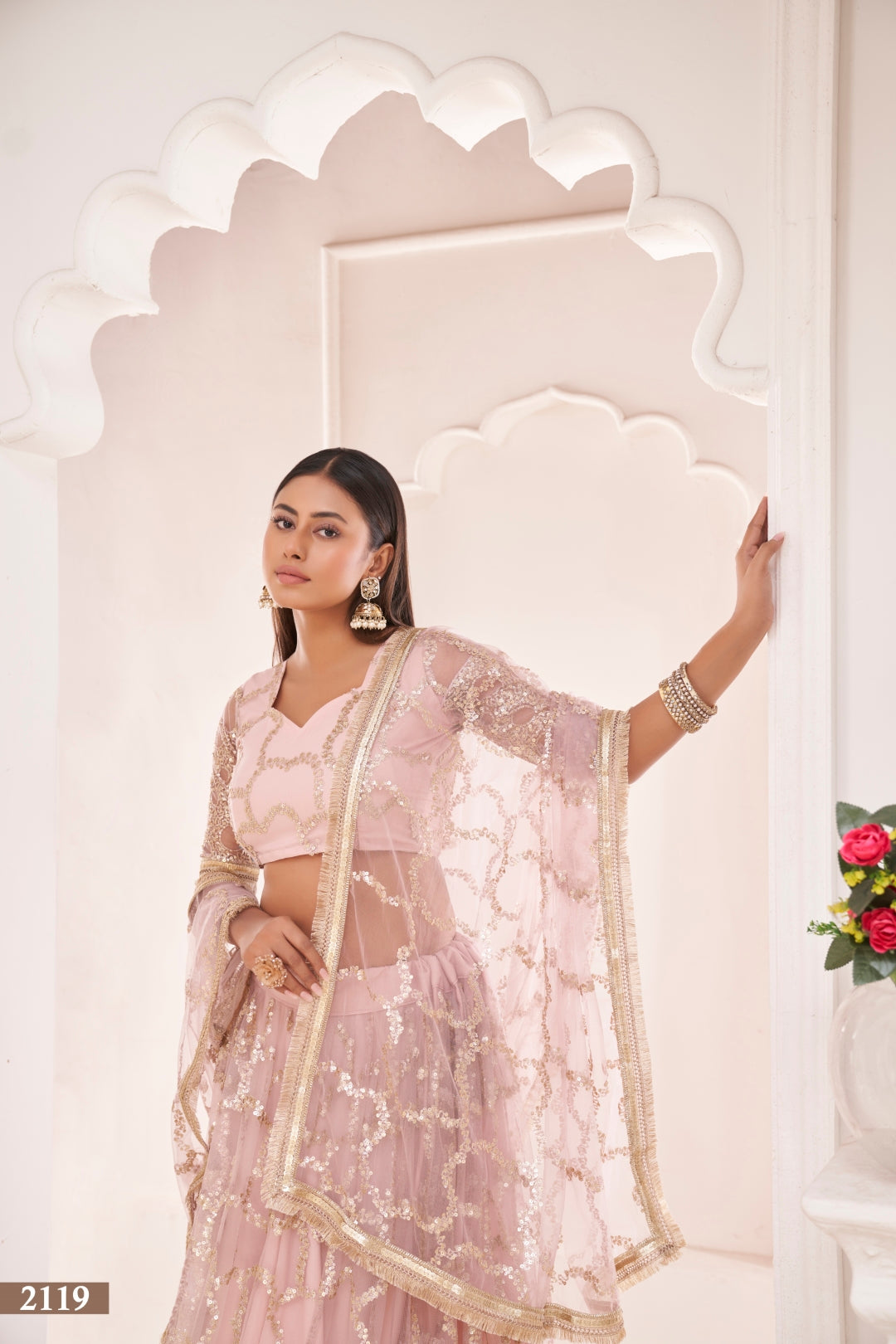 Baby Pink Elegant Butterfly Net Lehenga with Zari & Sequence Embroidery Clothsvilla