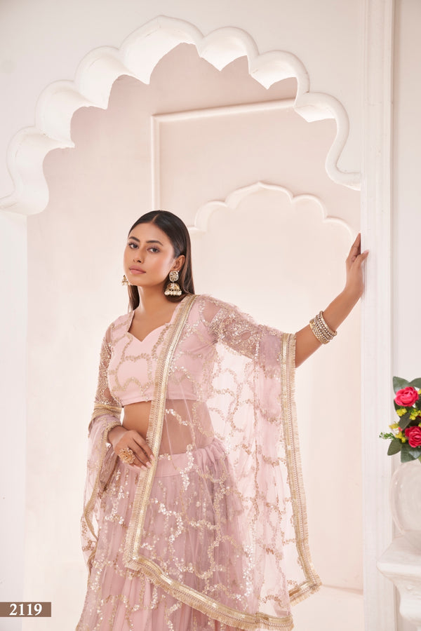 Baby Pink Elegant Butterfly Net Lehenga with Zari & Sequence Embroidery Clothsvilla