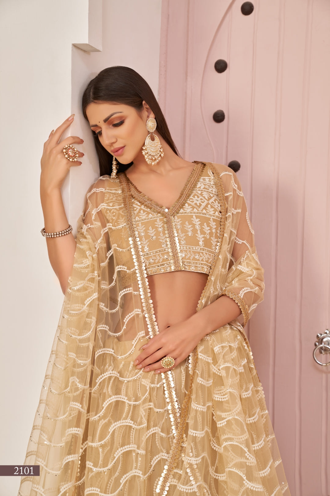 Beige Chiqu Butterfly Net Lehenga with White Cotton Thread, Zari, and Sandwich Sequence Embroidery ClothsVilla