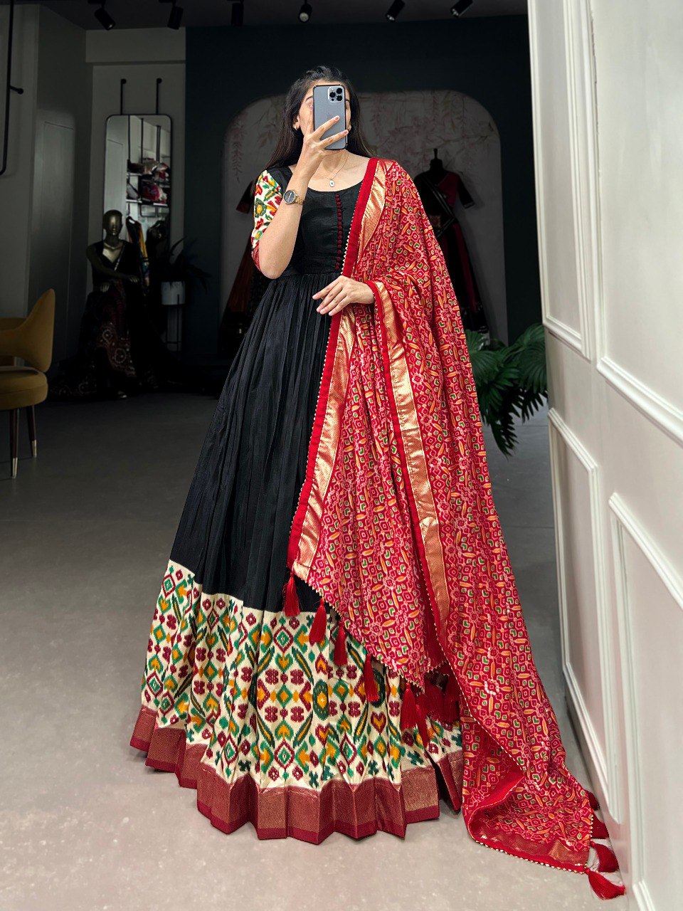 Black Dola Silk Gown with Patola Print Dupatta – Modern Elegance with Foilwork Flair