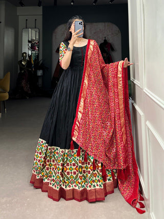 Black Dola Silk Gown with Patola Print Dupatta – Modern Elegance with Foilwork Flair