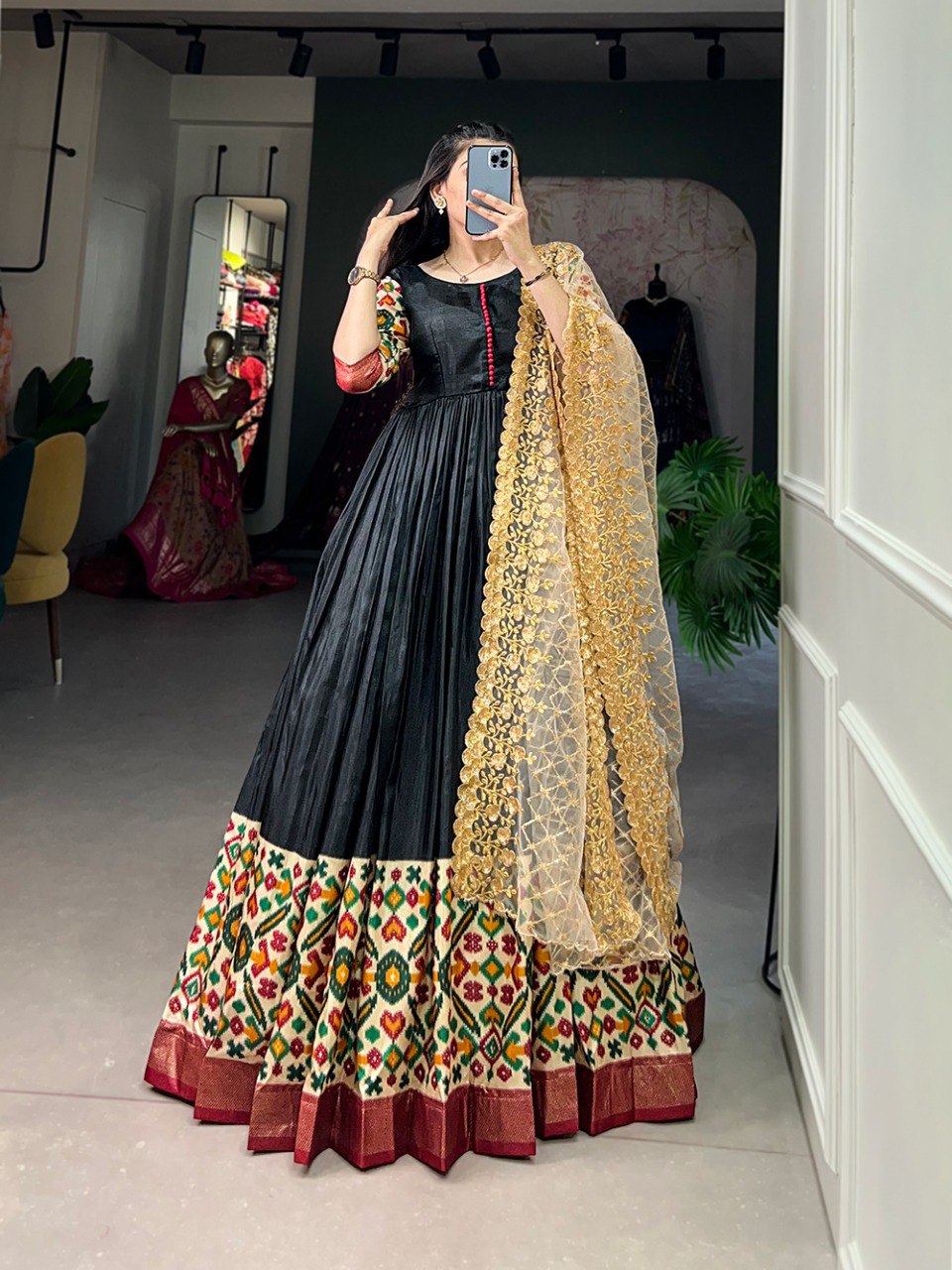 Black Dola Silk Gown with Patola Print Dupatta – Modern Elegance with Foilwork Flair