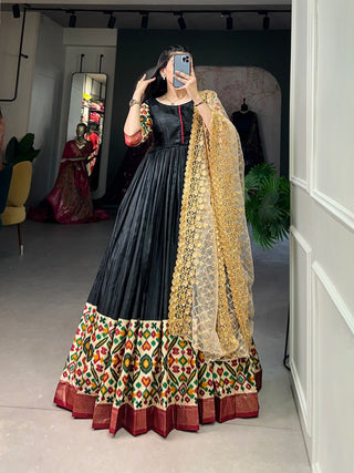 Black Dola Silk Gown with Patola Print Dupatta – Modern Elegance with Foilwork Flair