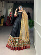 Load image into Gallery viewer, Black Dola Silk Gown with Patola Print Dupatta – Modern Elegance with Foilwork Flair