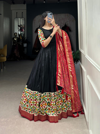 Black Dola Silk Gown with Patola Print Dupatta – Modern Elegance with Foilwork Flair